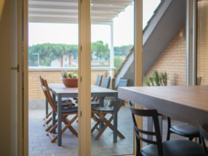 luxury home interior design Turella Nico Celidoni progetto ristrutturazione restyling attico dettagli lusso italian style terrazza vista skyline Appia Antica
